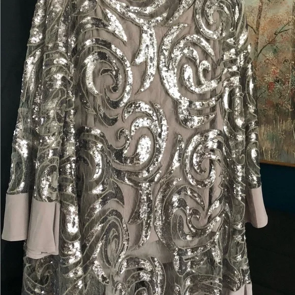 Dress with elegance with this women's three-piece set from R&M Richards. - Picture 2 of 10